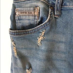 Distressed jean skirt